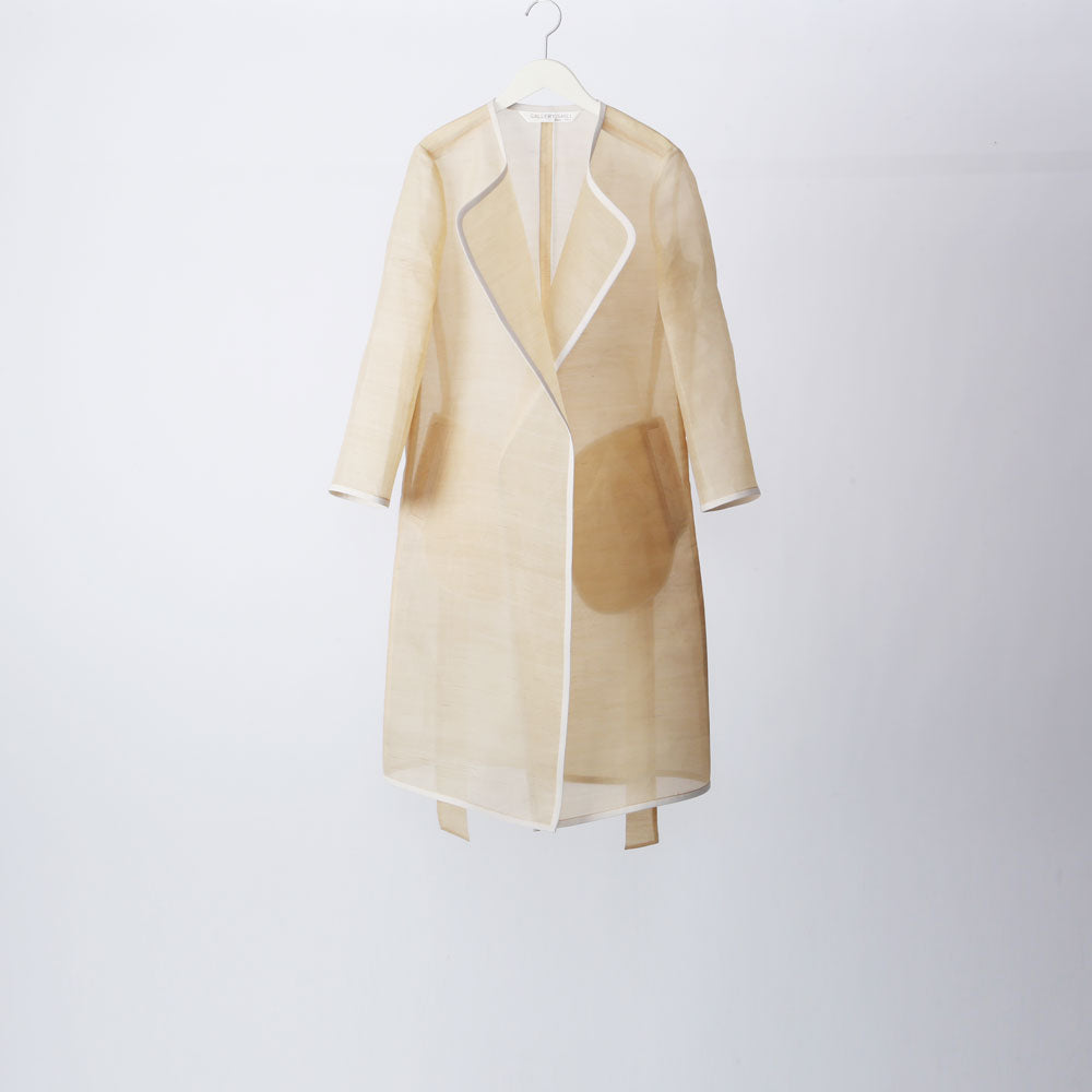 Woman in a lacquered jacket