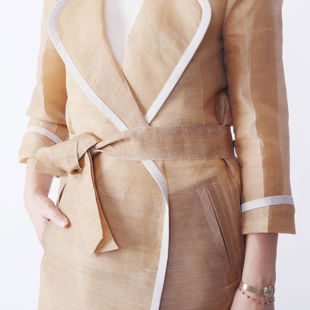 Woman in a lacquered jacket